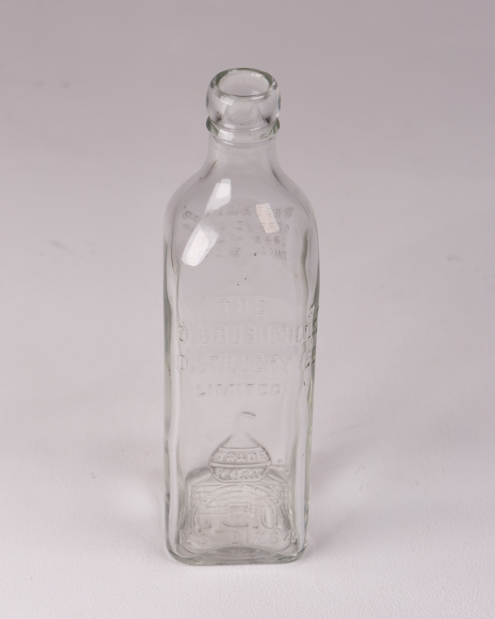 Vintage The Old Bushmills Distillery Glass Whiskey Bottle, Clear