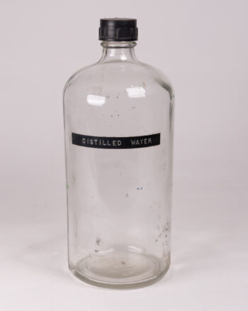 Vintage Distilled Water Bottle, Clear Glass with Black Lid, Collectible