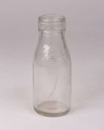 Vintage Clear Glass Milk Bottle with ‘MILK BOTTLES (N.I.) LTD’ Embossed Logo