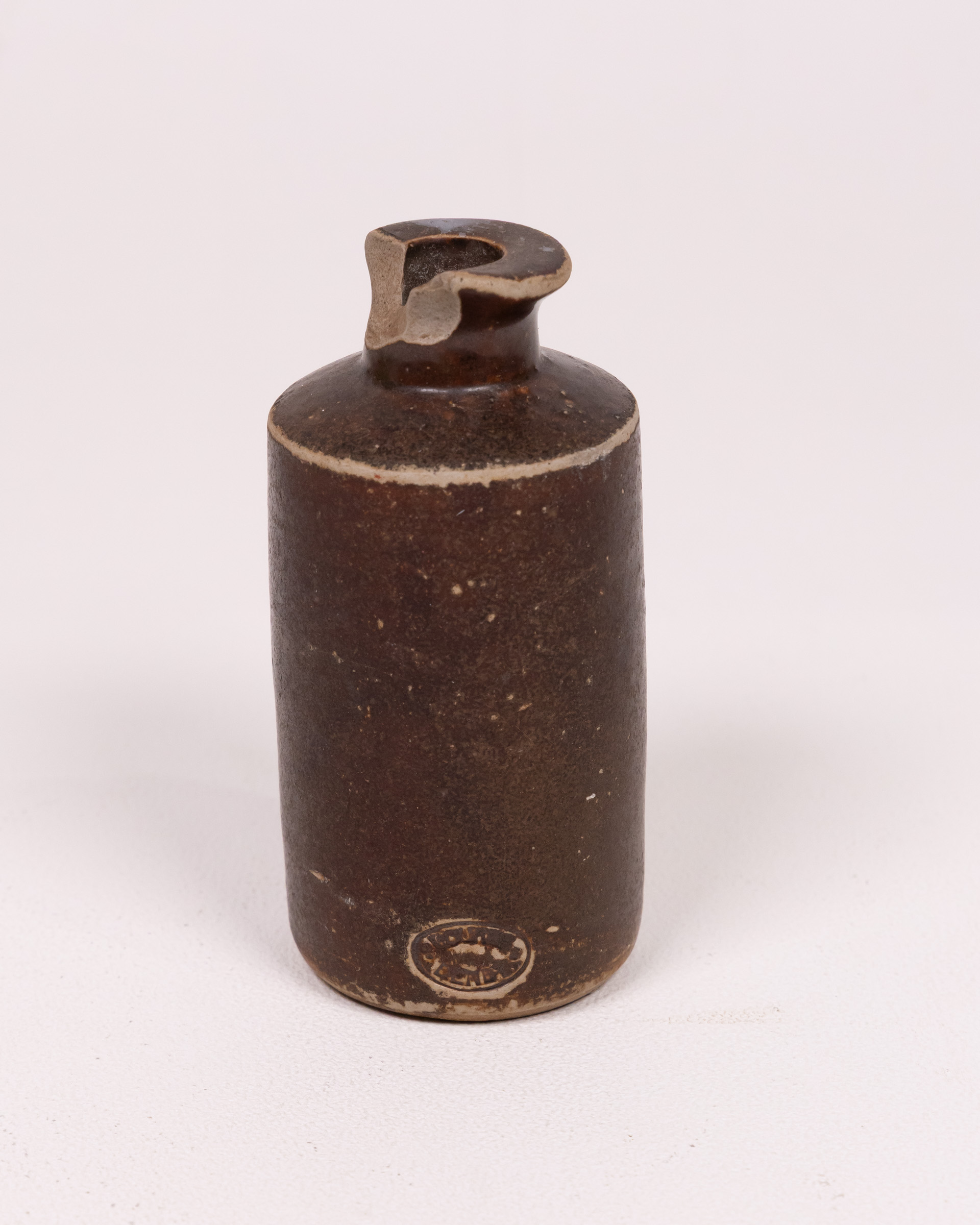 Small Brown Stoneware Bottle/Vase with Embossed Company Mark