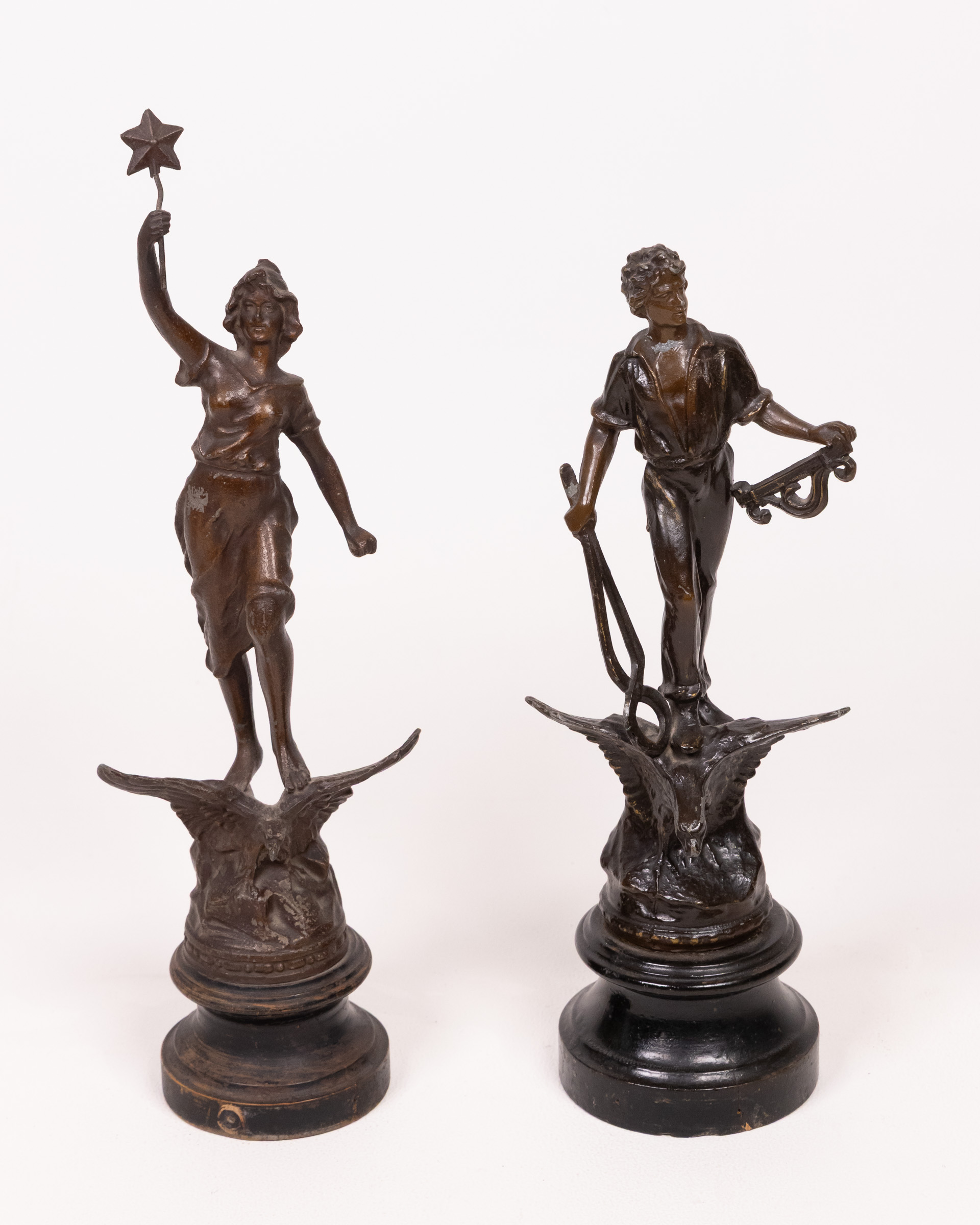 Pair Bronzed metal Figural Statues, Classical Figures on Eagle Bases, Wooden Plinths