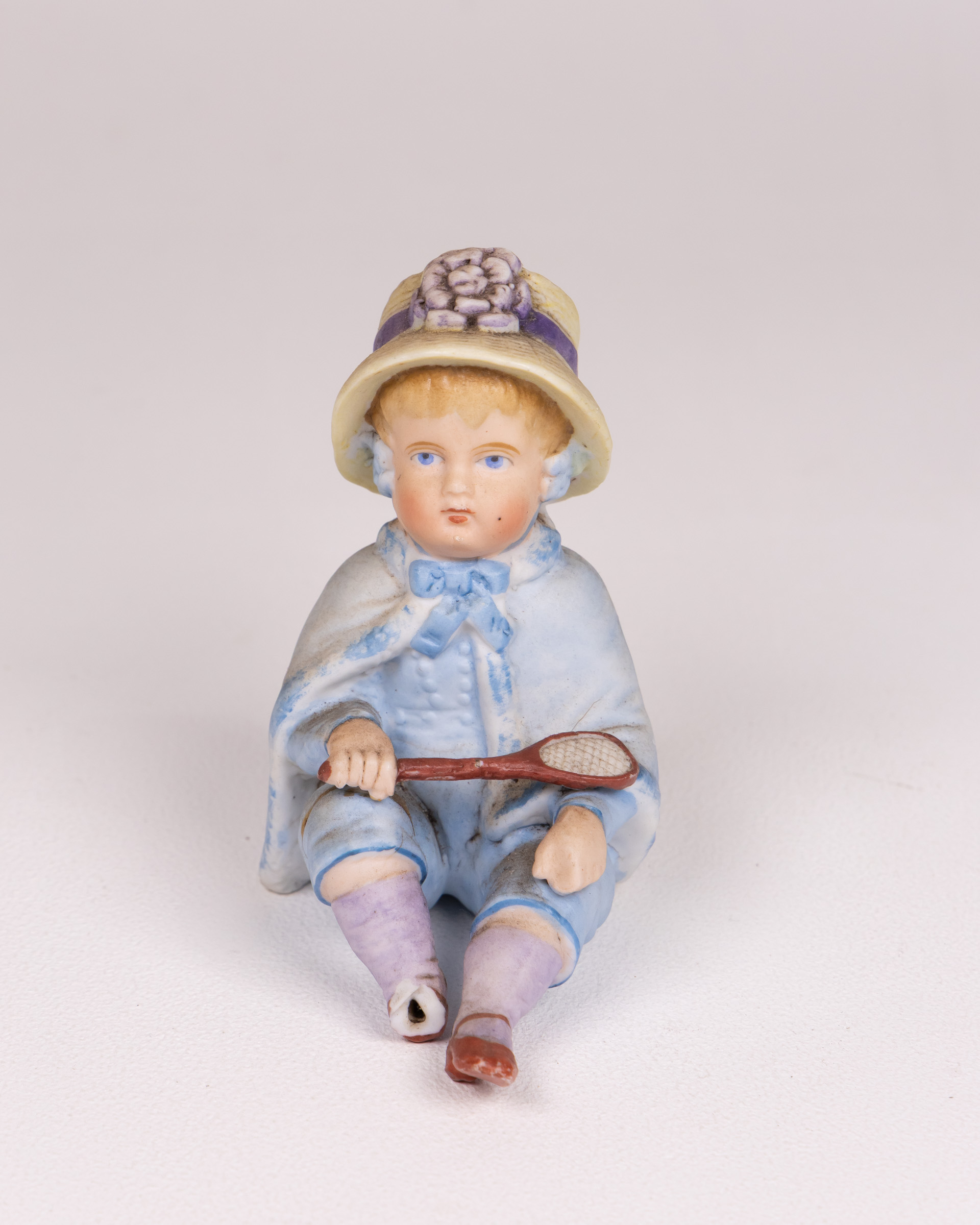 Vintage Hand-Painted Ceramic Boy Figurine with Racket, Blue & Cream
