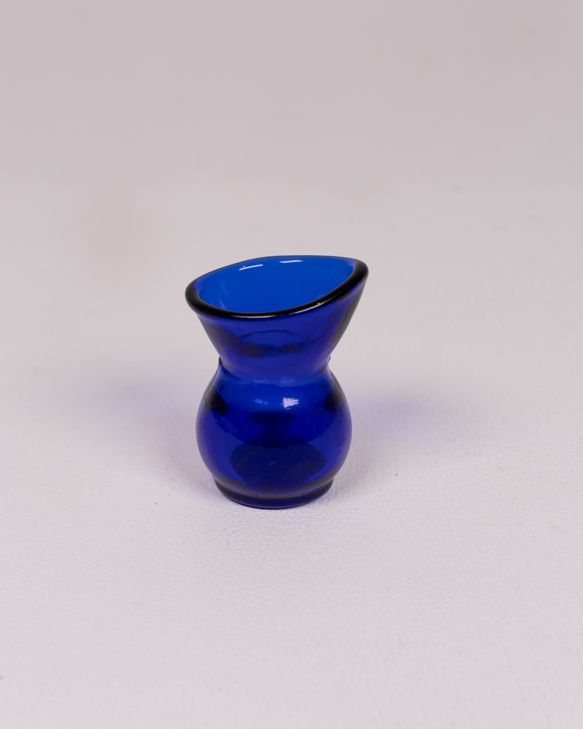 Antique hand Blown Blue Glass Eye Bath with Black Rim