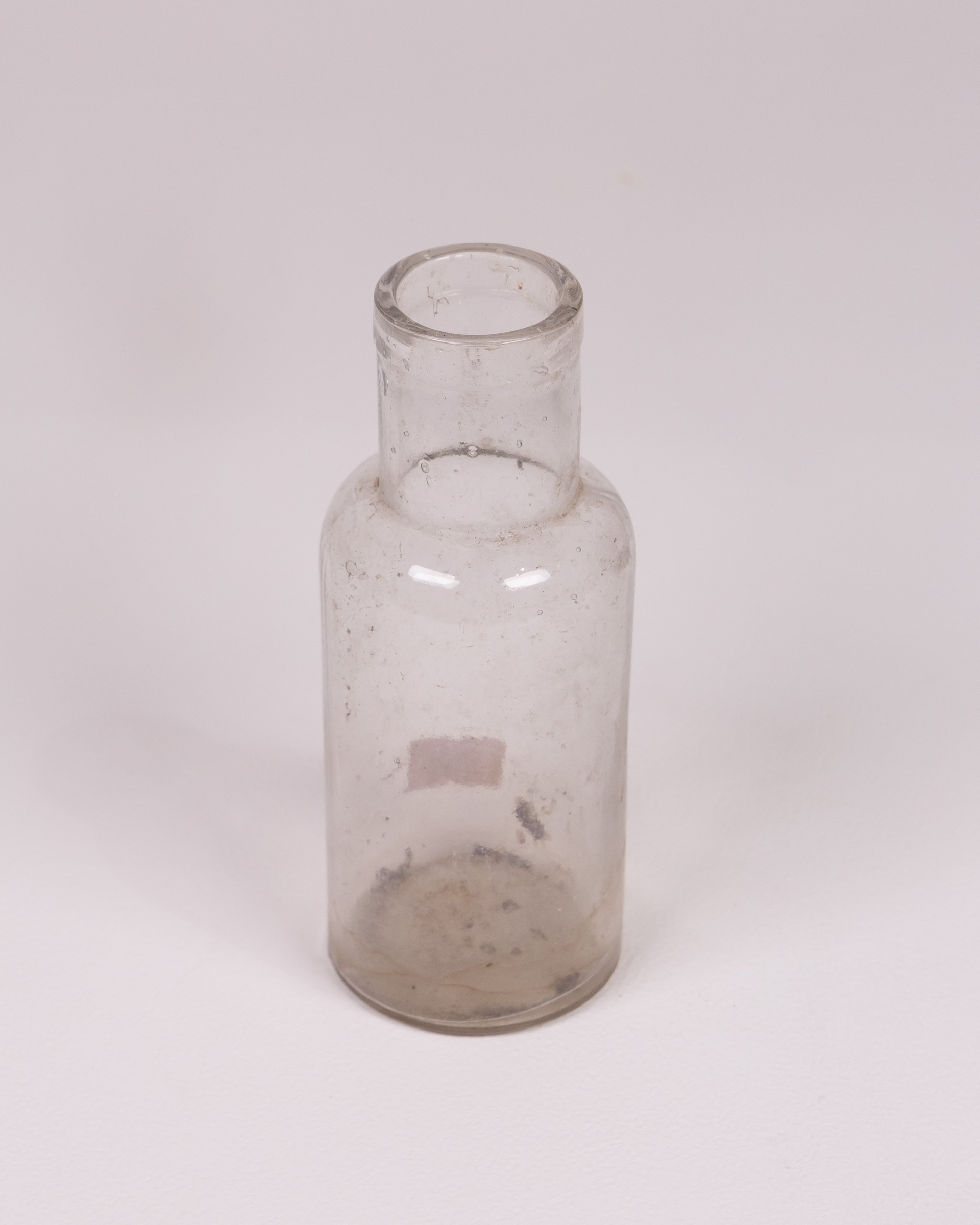 Vintage Clear Glass Bottle with Round Body
