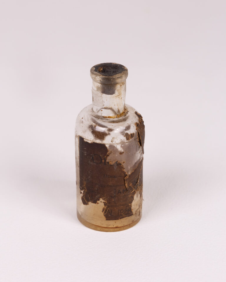 Vintage Glass Medicine Bottle with Paper Label