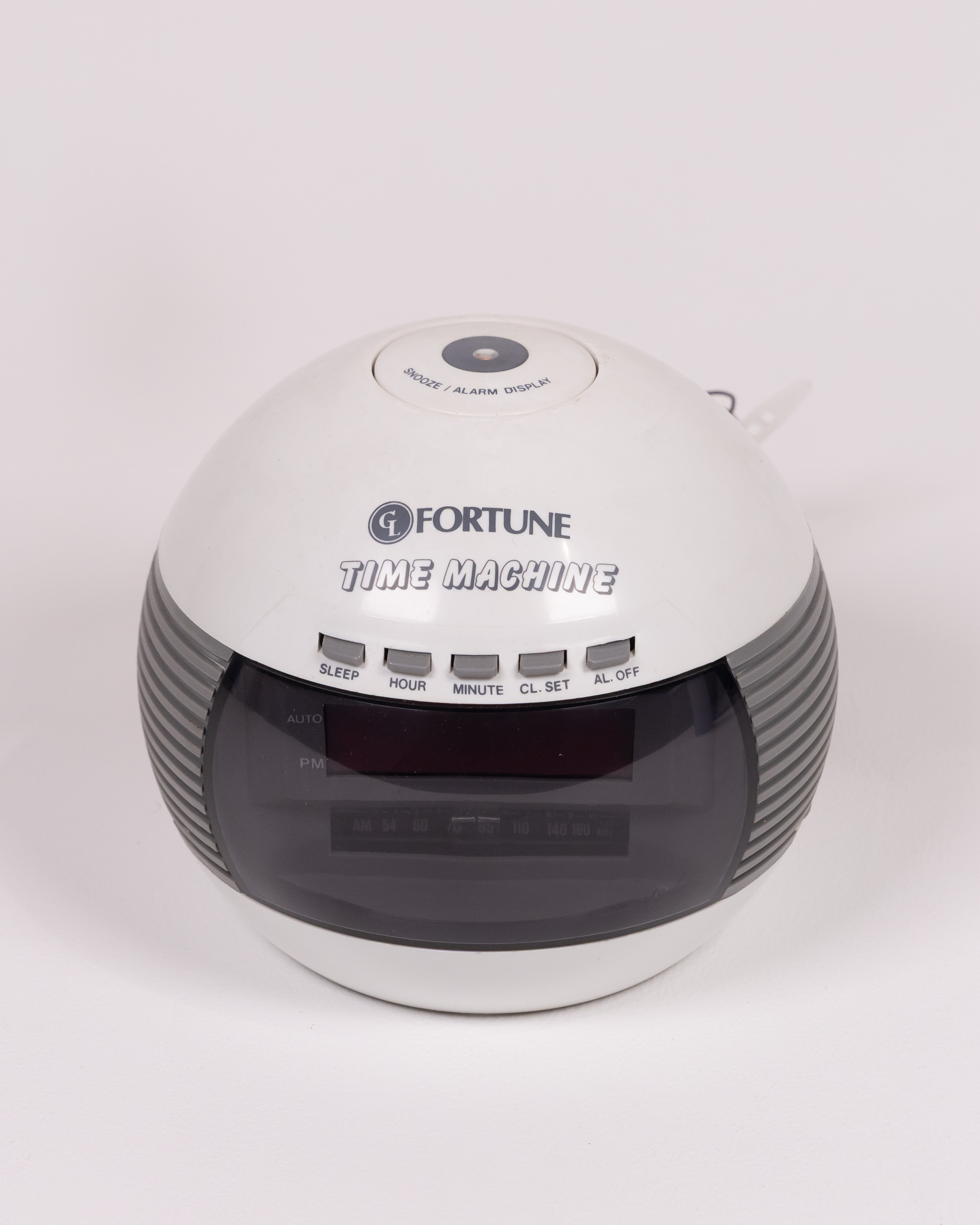 Fortune Time Machine Plastic Radio Alarm Clock