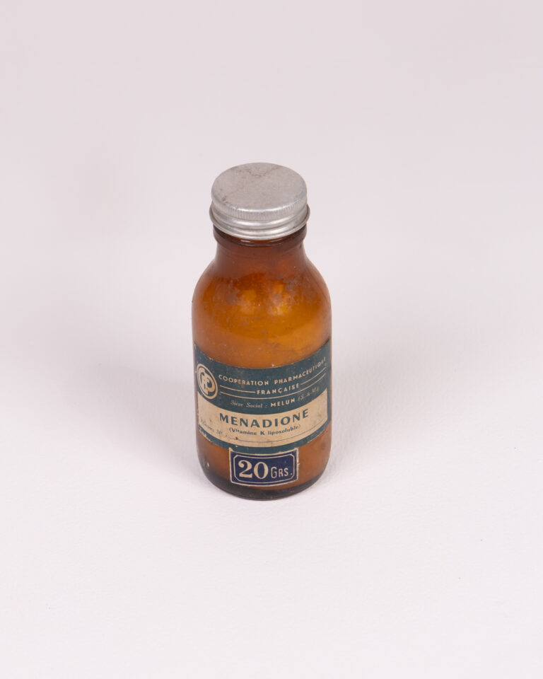 Vintage Medical Glass Bottle with Menadione Label