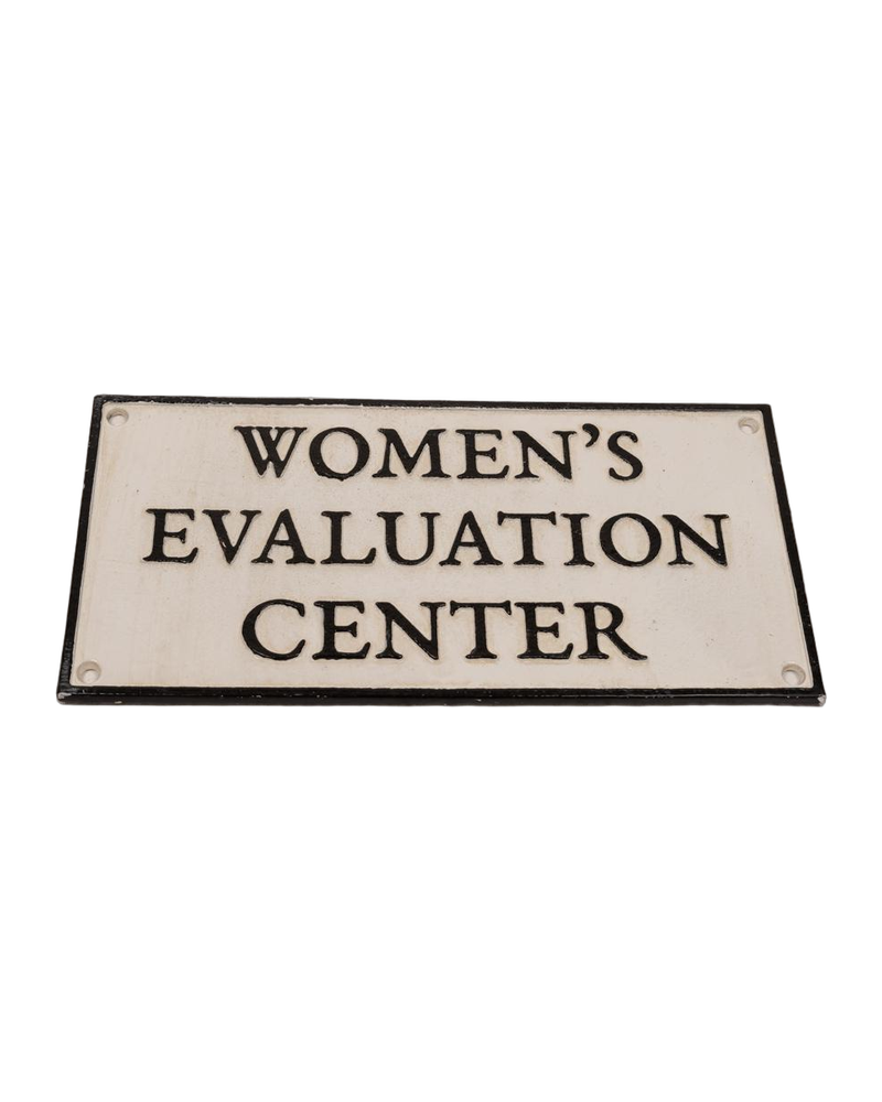 Cast Iron Women’s Evaluation Centre Sign