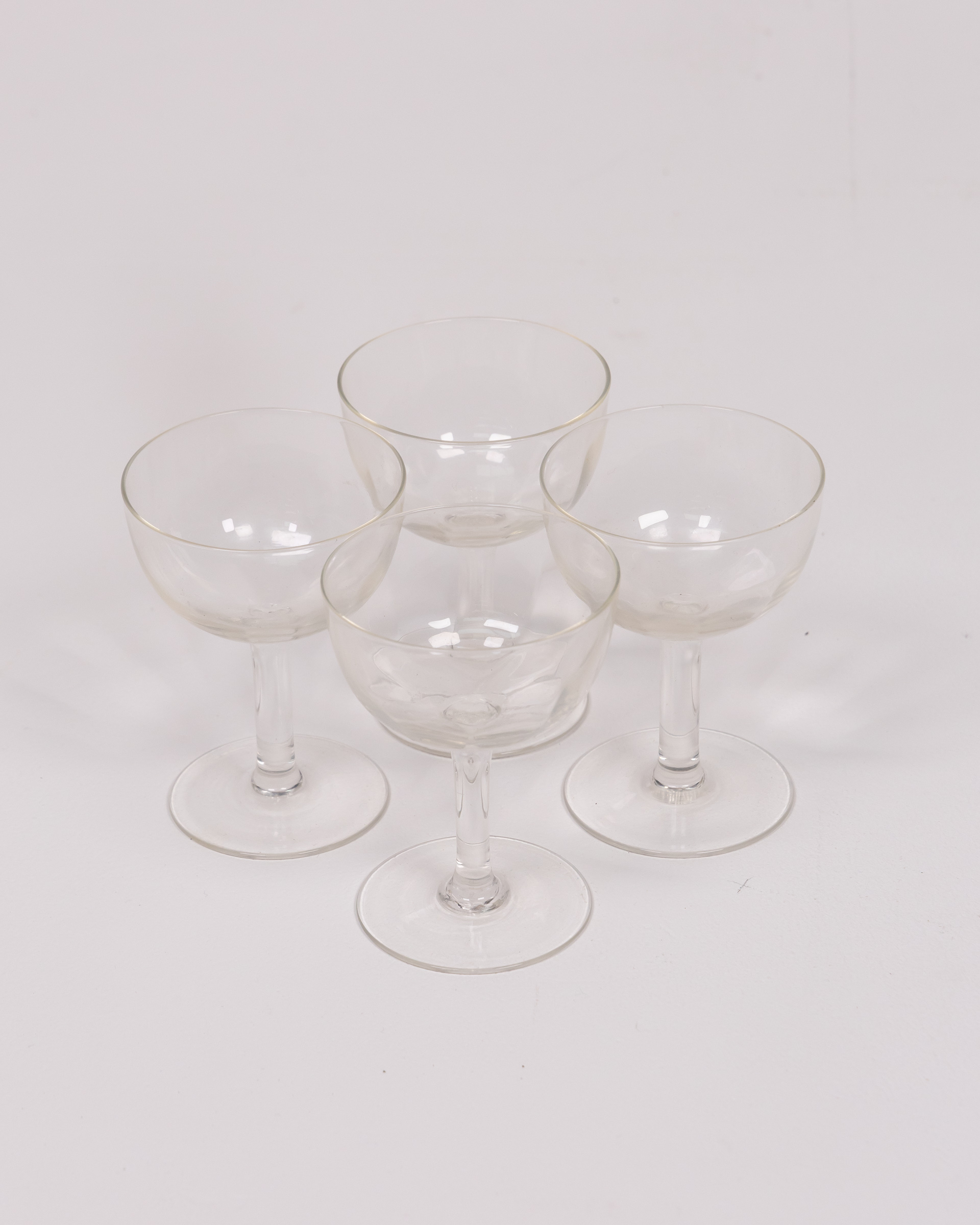 Set of Four Clear Glass Champagne Coupes