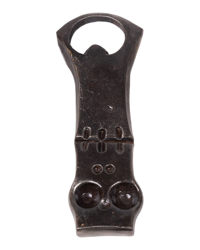 Vintage Cast Iron Bottle Opener with Skull Design
