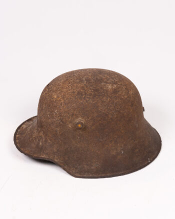 Antique WWI M16 German Steel Helmet with Battle Wear