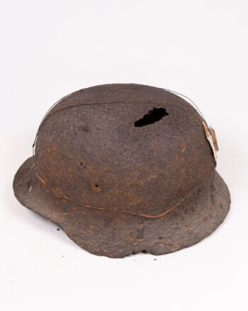 Vintage German M35 Steel Helmet with Battle Damage