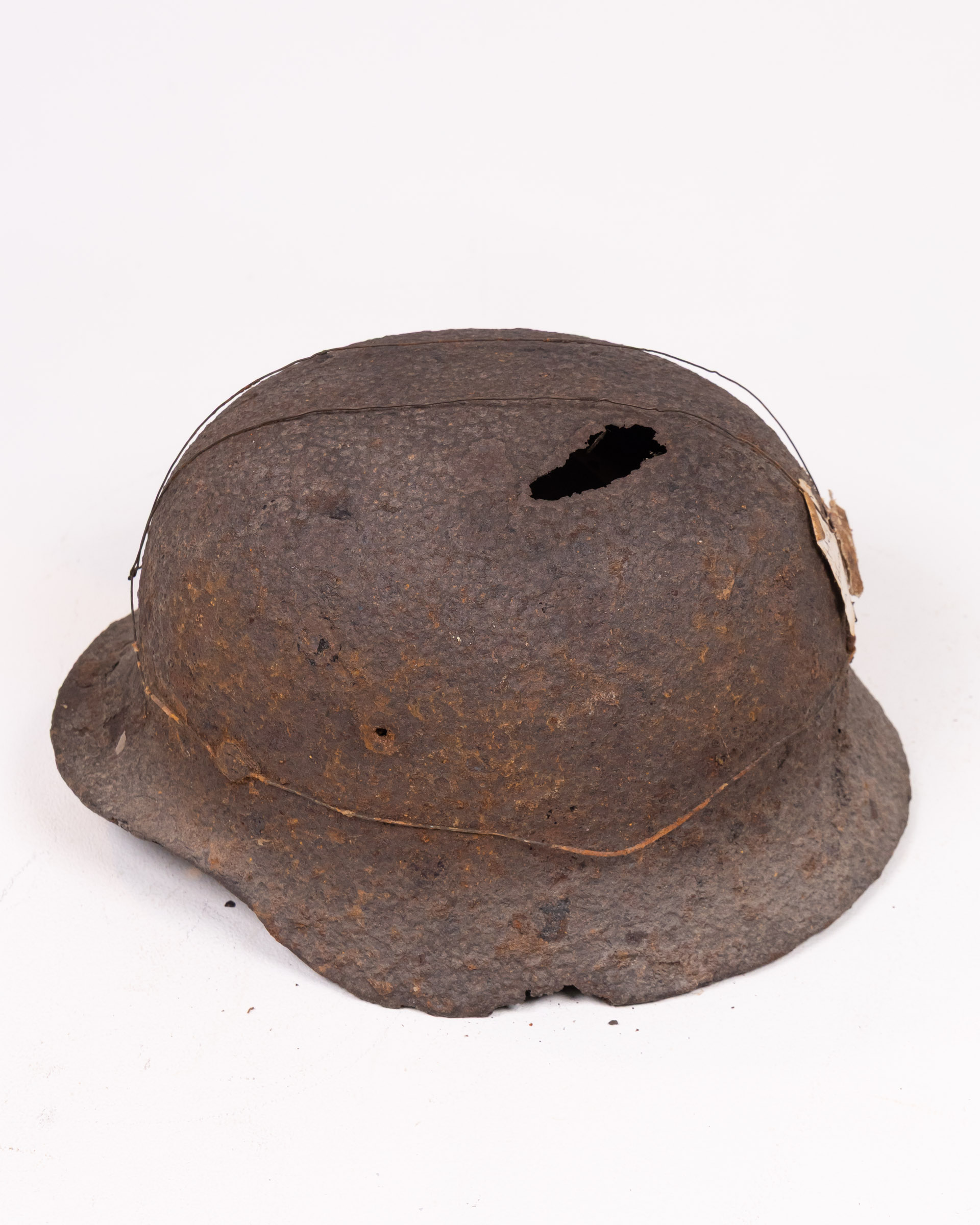 Vintage German M35 Steel Helmet with Battle Damage