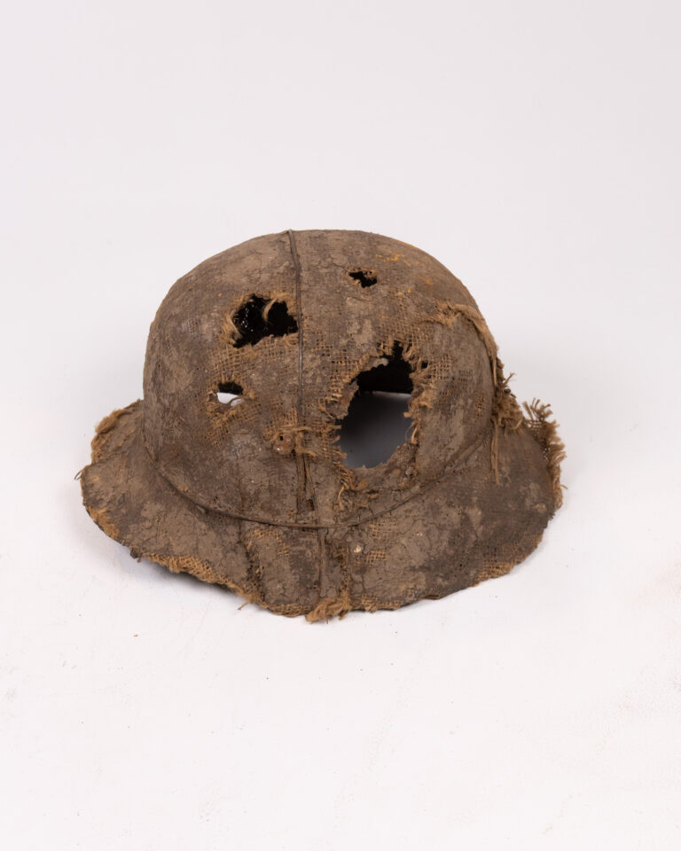 Vintage Fabric Military Helmet with Distressed Appearance