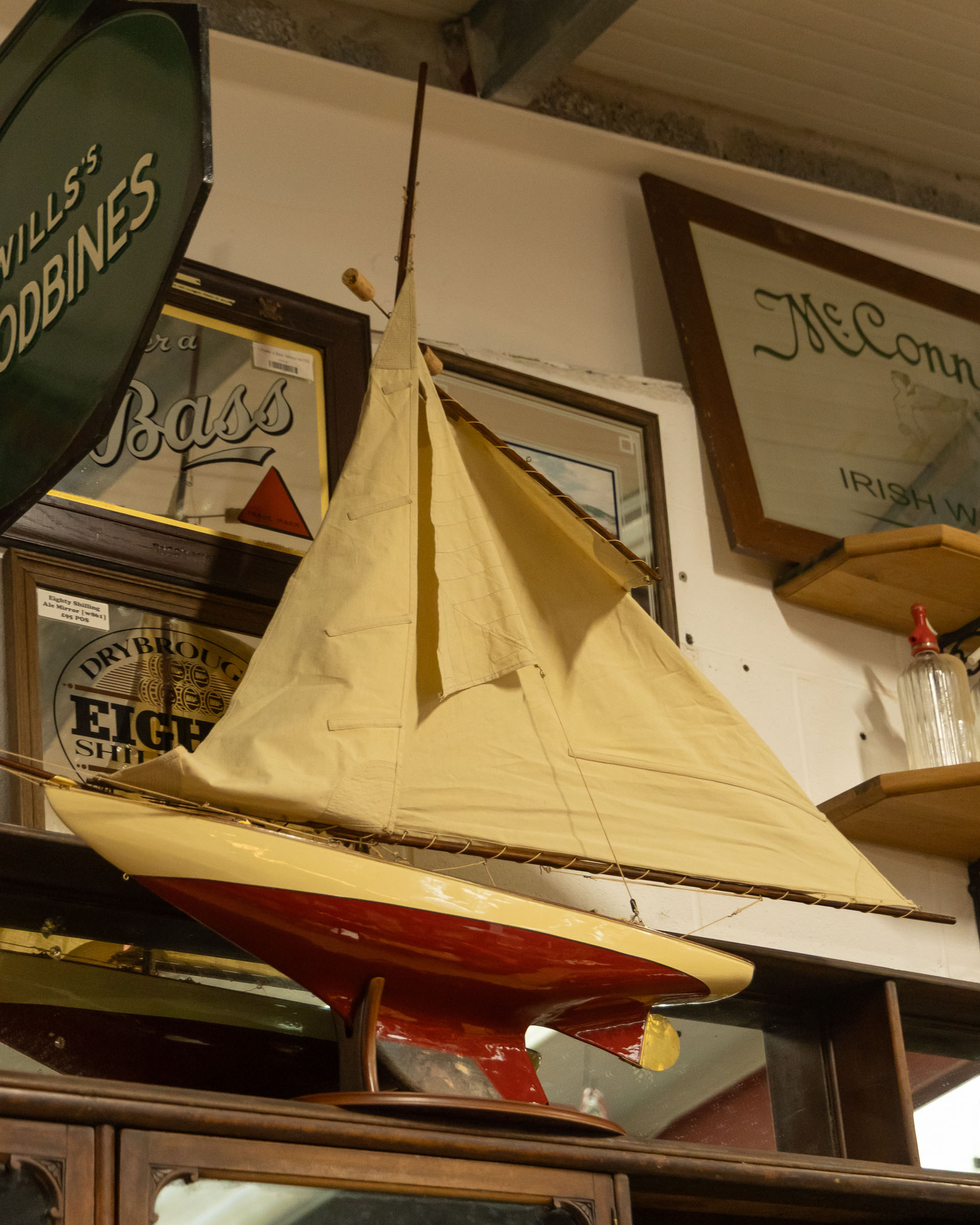 Vintage Wooden Sailboat Model with Fabric Sail