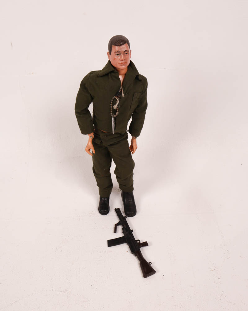 Vintage Action Man Figure with Gun and Outfit