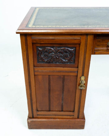 Antique Mahogany Leather Top Desk with Carved Details