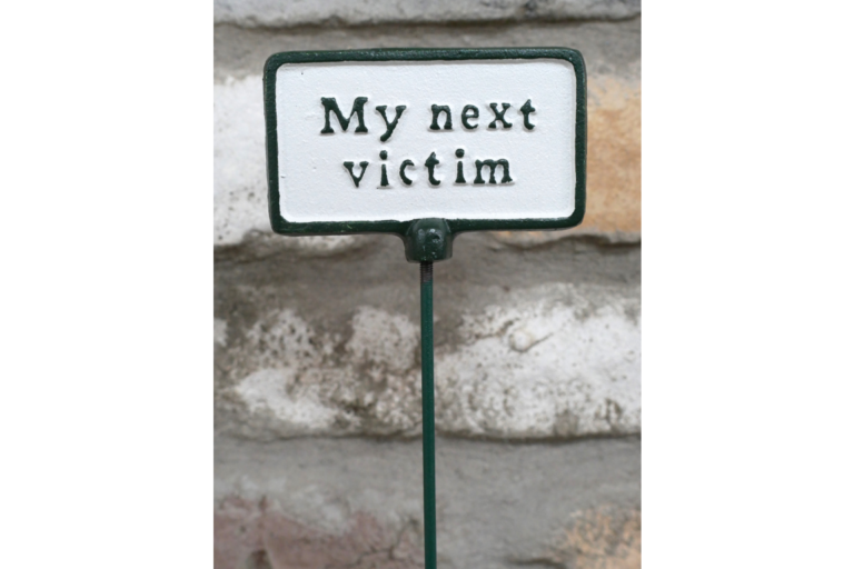 Cast Iron Garden Sign with 'My Next Victim' Slogan