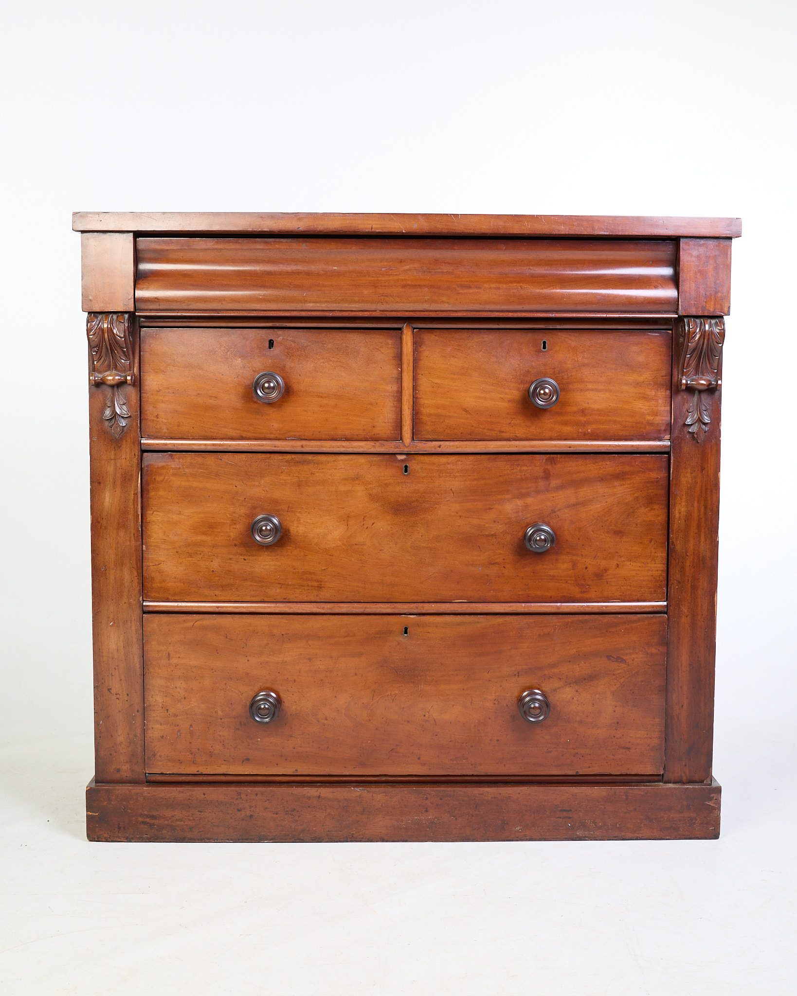 Antique Mahogany Chest of Drawers with Carved Details