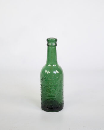 Vintage Green Glass Bottle with Embossed Details