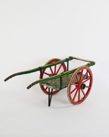 Vintage Wooden Cart with Red Spoked Wheels and Green Paint