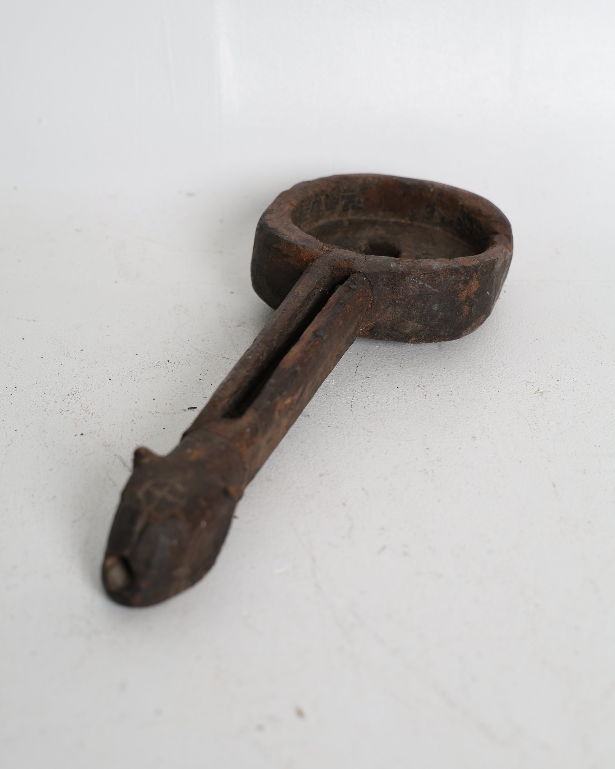 Rustic Carved Wooden Ladle with Animal Head Detail