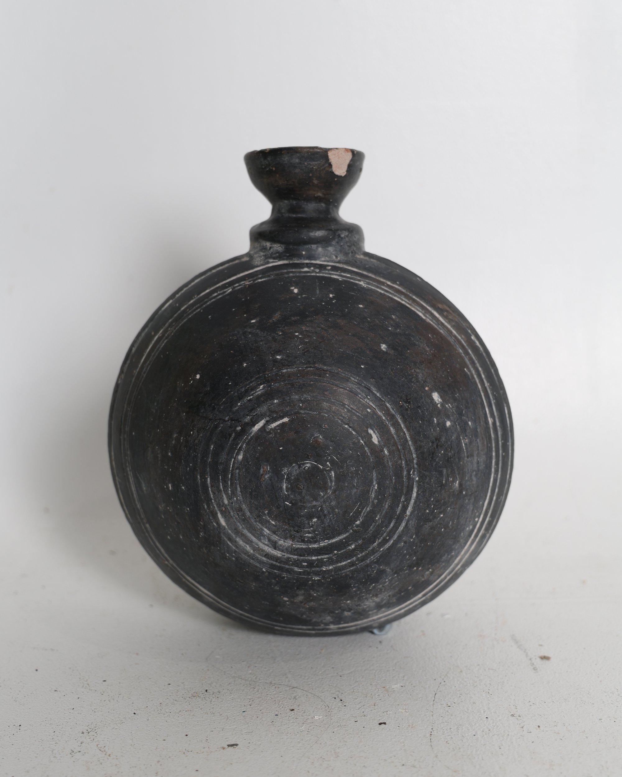 Rustic Dark Earthenware Flask with Concentric Incised Detail