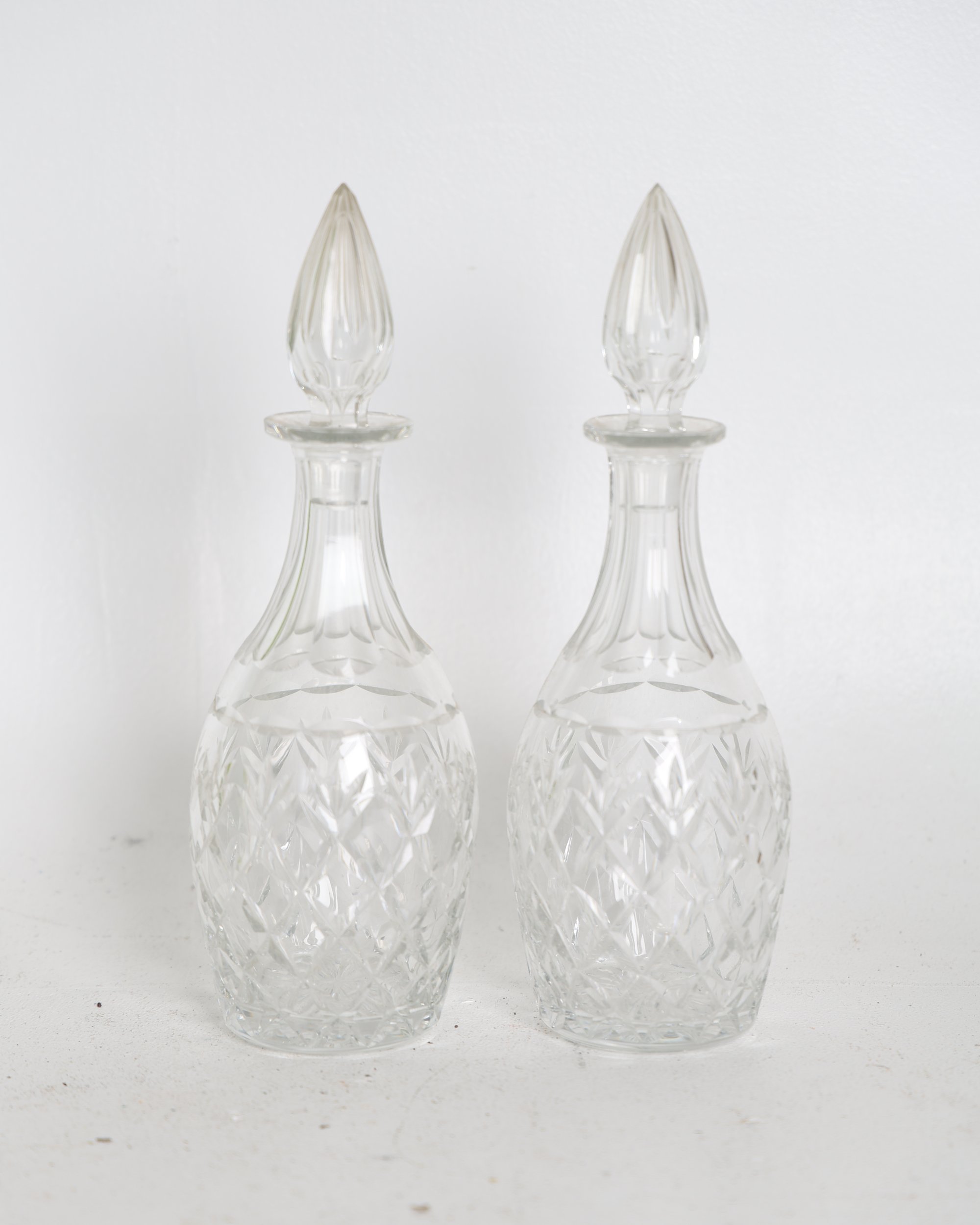 Pair of Cut Glass Decanters with Spire Stoppers
