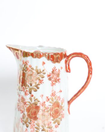 Decorative Ribbed Porcelain Jug with Orange and Gold Floral Pattern