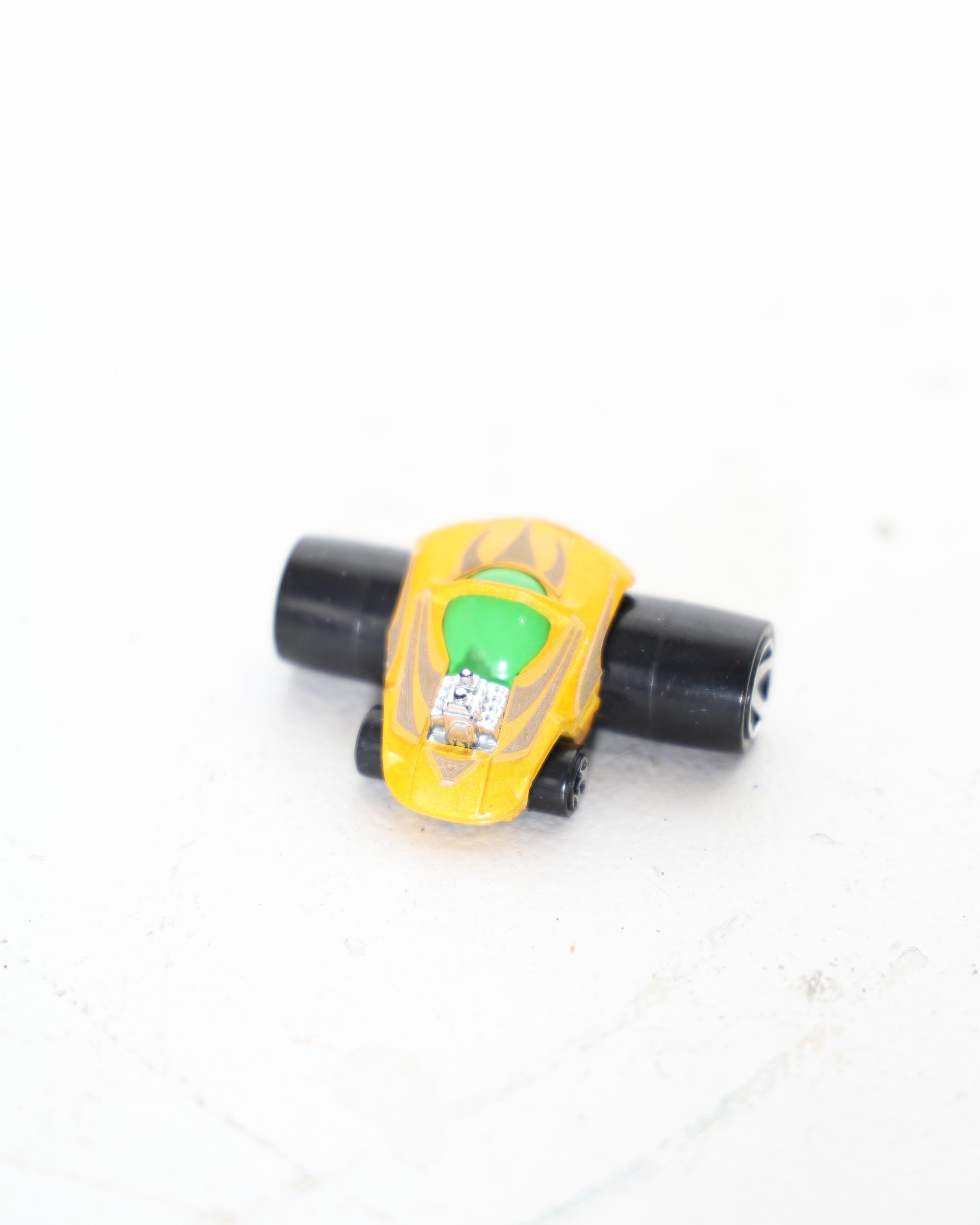 Yellow Mattel 2004 Toy Car with Oversized Rear Wheels