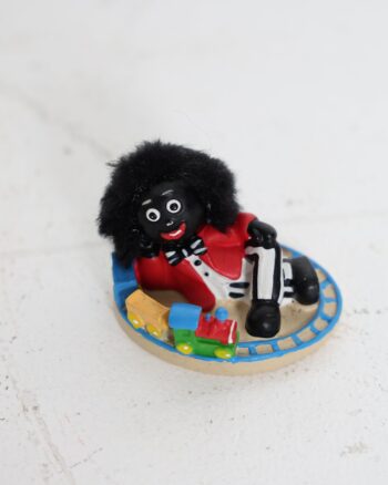 Vintage Style Golly Figurine with Toy Train on Track