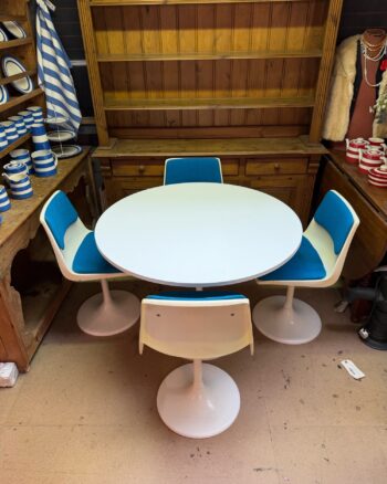 Retro Round Pedestal Dining Table with Four Blue Chairs