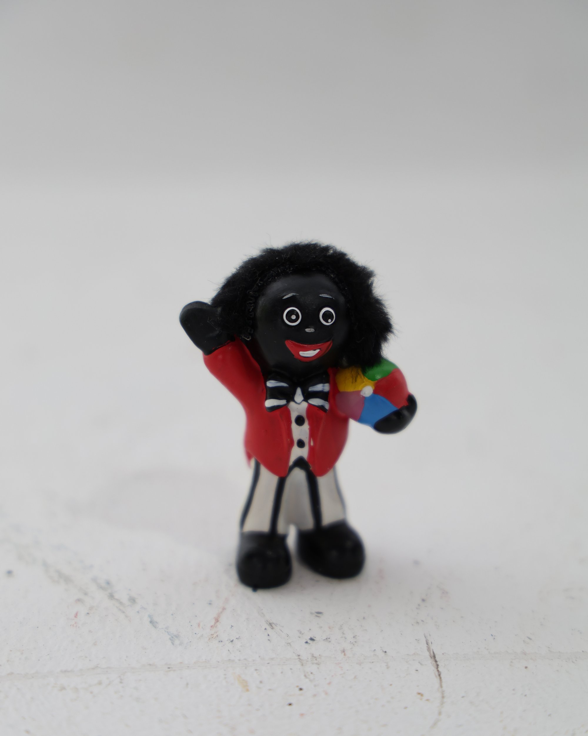 Vintage Robertson Golly Figurine Holding Beach Ball