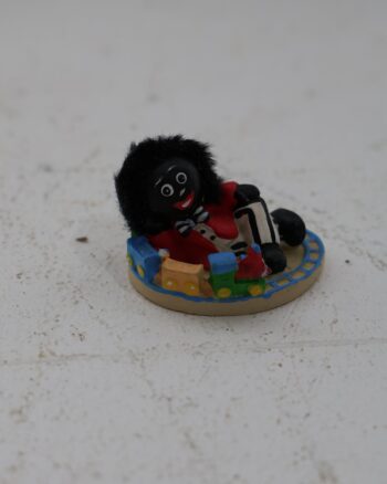 Golly Collectable Figurine on Train Track