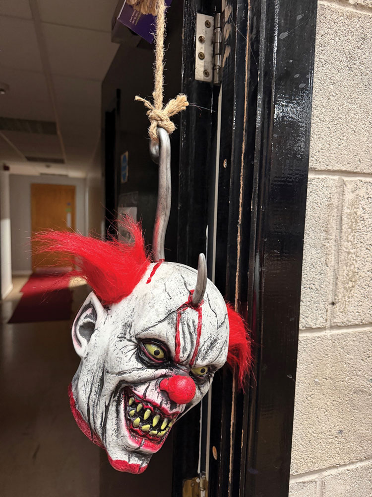 Severed Clown Head with Hook Halloween Prop