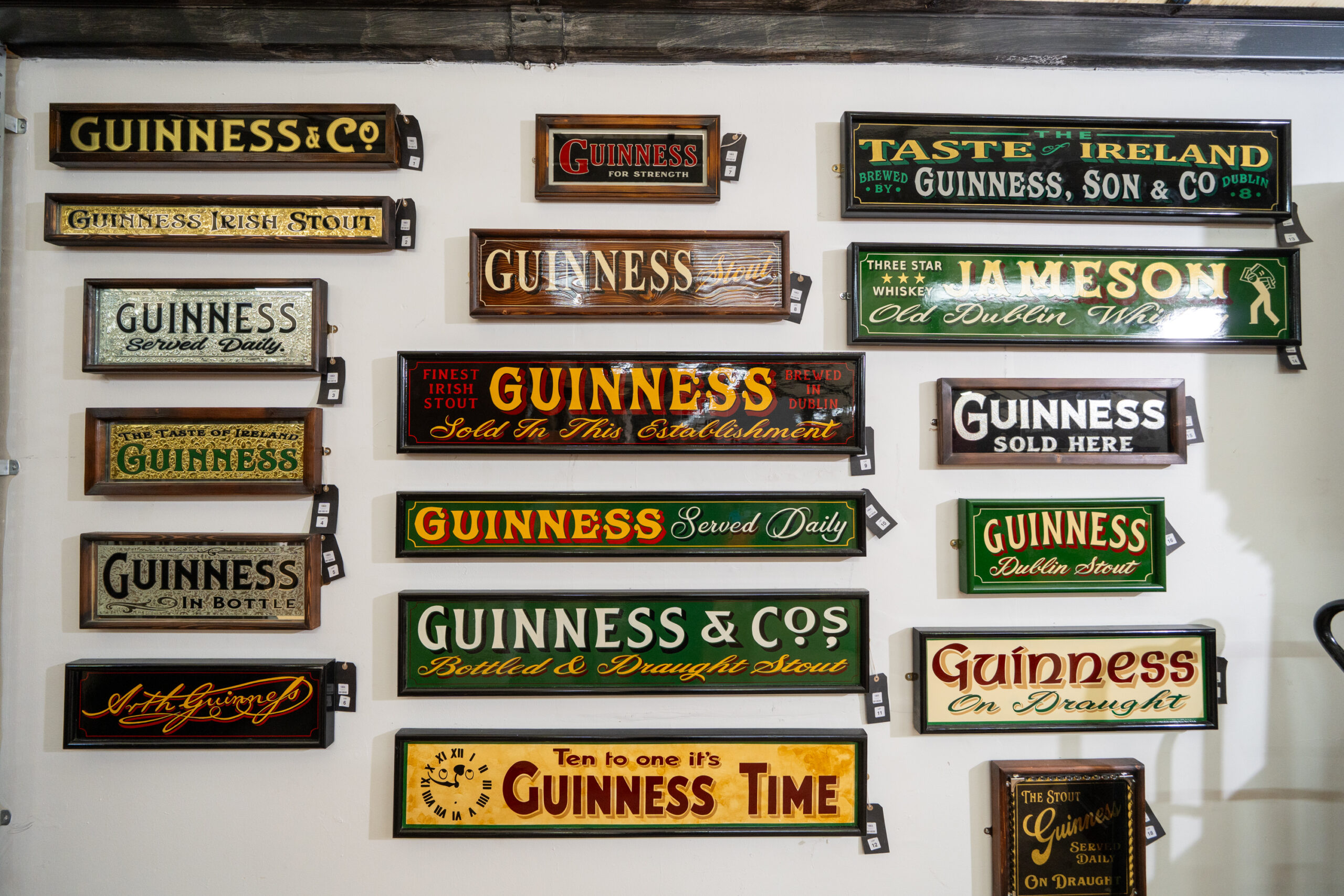 Selection of Guinness advertising signs and mirrors
